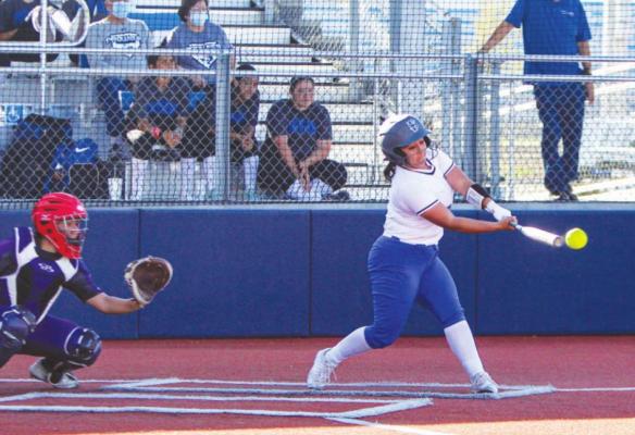 Fort Stockton’s Shelby Murphy makes contact with a pitch in the third inning of Tuesday’s game against Pecos at home. Photo by Nathan Heuer