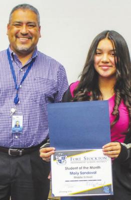 Maily Sandoval was recognized as the Fort Stockton Middle School Student of the month at Wednesday’s meeting. Pictured with Sandoval is associate middle school principal Omar Sanchez.