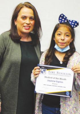 Jaylene Espino was recognized as the Alamo Elementary Student of the Month for January at Wednesday’s meeting. Espino is pictured with Alamo principal Linda Chavez.