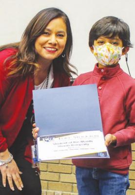 Shaan Boinpally was selected as the Apache Elementary Student of the Month for January. Boinpally is pictured with Apache principal Karina Pacheco.