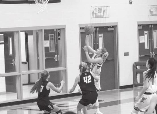 Iraan’s Maddy Harvey attempts a layup on Tuesday, Dec. 8 in a home game against Wink. Harvey tallied two points in the Bravettes 14-point loss. (Photo by Jessica Rodriguez)
