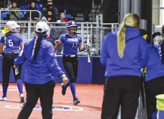 Fort Stockton junior Alyana Dominguez (13) celebrates a home run on the way to the Prowlers dugout on Saturday during the Comanche Classic. The solo shot came against the Odessa High junior varsity squad in the night cap game. Photo by Nathan Heuer