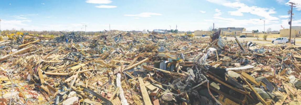A pile of ruble was all that was left of the old Pecos County Hospital that was located on Spring Drive near Sanderson Highway after an excavator and a bulldozer demolished the building on March 3. Photo by Jeremy Gonzalez