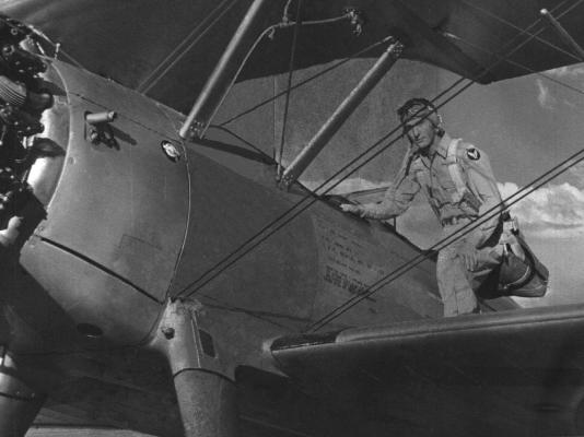 John Collins, the uncle of Fort Stockton’s DA and Beth Harral, with his Stearman bi-plane at the Marfa airfield. Courtesy Photo
