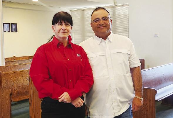 Renee Gaylor and Pct 1 county commissioner Francisco Ramirez photographed at the recent commissioner’s court meeting. Gaylor awarded the county a generous $5,000 donation on behalf of the Camanche Springs Rodeo and the Chamber of Commerce. Pioneer Photo by Joh Covington