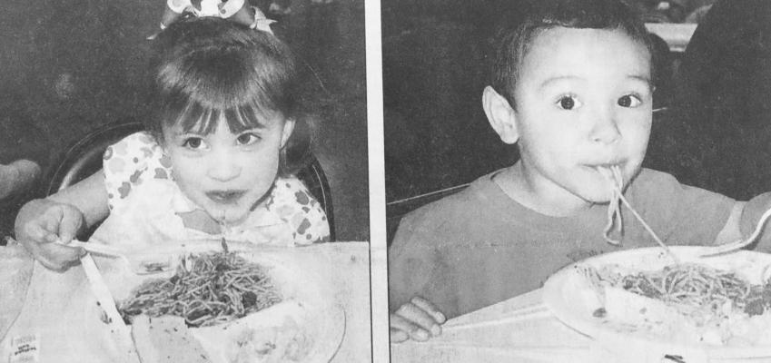 February 2009: Macy Rose Tippin and Ayden Adame enjoy a big plate of spaghetti at the annual Band Spaghetti Supper and Auction. The community dined and were treated to various solo and ensembles from the band members. Between the performances, cakes and pies were auctioned off by FSISD Superintendent Ron Mayfield.
