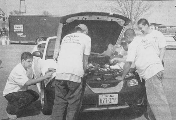 APRIL 2002- The Chaos Racing Team checks out one of the cars on their teams displayed in Friday’s car show. The group volunteered to help with the Big Bend Open Road Race by helping block some of the gates along Hwy 285. Pictured are (l-r) Roman Ortega, John Brinegar, president Justin Canva, Mario Car-rasco and vice-president Jesse Mireles. Not pictured is John Carreon