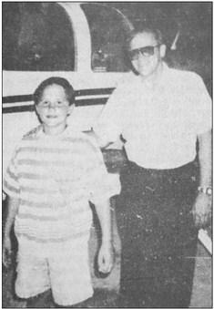 September 1990: YOUNG AVIATOR – Davlin Whitaker, nine years old, became a “Warden Ace” during this summer, placing him in an elite group with less than 500 members. Gary Warden is his flight instructor. Davlin was able to take off, fly the pattern and land the plane with no assistance. Davlin is the son of Kerri Gandy.