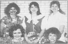 September 1990: NEW OMICRON MU OFFICERS – Beginning the 1990-1991 year are (seated, from left) Janice McKenzie, vice-president, and Peggy Elliott, president; standing from left, are Renee Bruno, treasurer; Leffin Molter, corresponding secretary, and Rhonda Scott, recording secretary. Connie Morrow (not pictured, is city council representative.