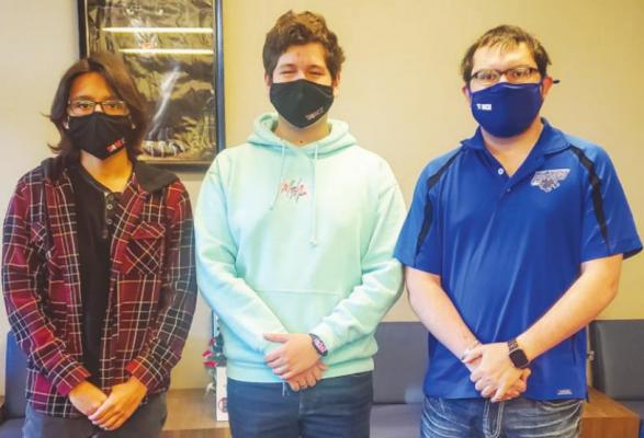 Fort Stockton High School science teacher Marcos Mendoza is filled with overflowing pride as two of his students participate in the NASA High School Aerospace Scholars Program. Pictured from left to right: Aiden Rayos, Fernando Corrales and Marcos Mendoza. Photo by Megan Wehring