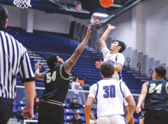 Fort Stockton’s Devon Rodriguez, right, releases a floater over a Lamesa defender on Friday, Dec. 11 at the Special Events Center. Rodriguez scored a season-high 18 points in the loss. (Photos by Nathan Heuer)