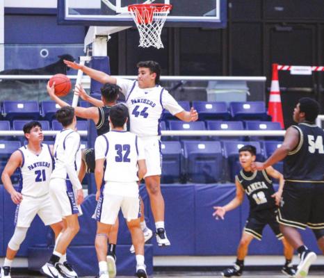 Fort Stockton sophomore Cruz Rojas (44) attempts to block a shot during the first half of Friday’s game against Lamesa on Dec. 11 at the Special Events Center in Fort Stockton.