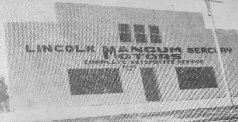 July 1954: NEW HOME FOR MOTOR FIRM – Mangum Motors will hold and open house in the firm’s new home at 319 E. Dickinson Blvd. L.T. Mangum, owner, bought the building recently from A.A. Rose and completed renovating the building and setting up equipment in it.