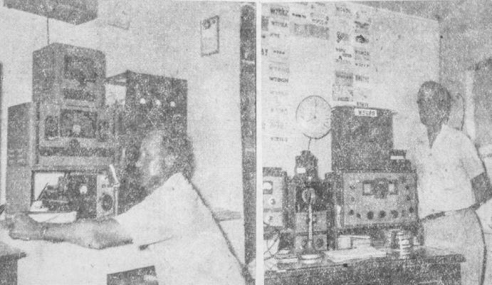 July 1954: RADIO RIG – Shown are Martin Bize, left, demonstrating his well-equipped radio rig, and D.S. Beeman, right, standing beside his transmitter, world clock, ad other fine equipment.