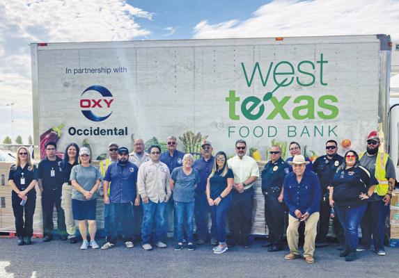 The City of Fort Stockton united with the Pecos County EMS and various volunteers last week to help give out food for the West Texas Food Bank outreach program. Photo by Jeremy Gonzalez