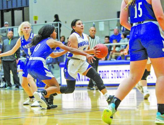 Fort Stockton senior Estrella Aguilar drives to the basket during the Prowlers win at home against Lake View on Dec. 13. Aguilar scored 11 points at the Buena Vista Longhorn Class last week. Photo by Nathan Heuer