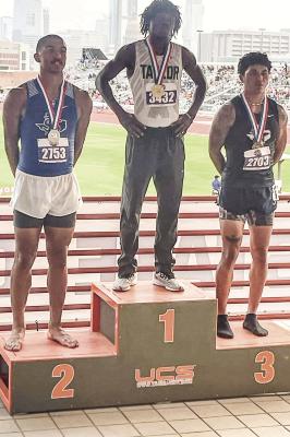 Zane Hodges, left, was second in the 300-meter hurdles at the state track meet May 11 in Austin. Courtesy photo