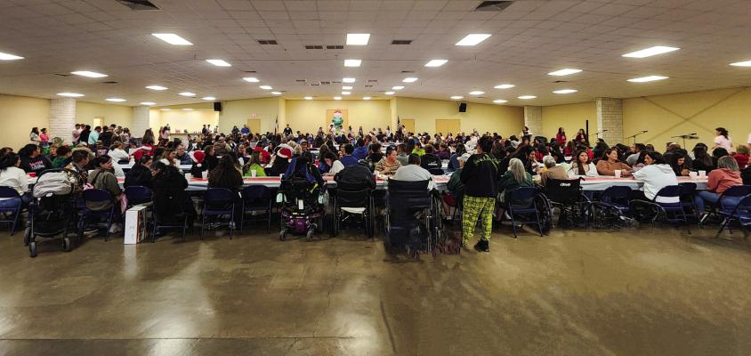 The Feast of Sharing, a long-running community event, is a true representation of Fort Stockton’s sense of togetherness, with countless individuals contributing to its success. The meal was served during lunch, providing a chance for neighbors and friends to connect over delicious food, while the local High School Choir and Band added to the festive atmosphere with holiday tunes. Photo by Tristian Barragan