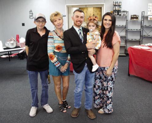 Pecos County Justice of the Peace candidate Rankin Mitchell, middle, held a meet and greet at Glitzy Brew in Fort Stockton on Oct. 1. Rankin is pictured with his brother Cole Mitchell, left, mother Vicki Mitchell, second from left, daughter Clara Mitchell, and wife Amanda Mitchell. Mitchell will be running against incumbent Ruben Salinas in this upcoming Nov. 8 election. Photo by Nathan Heuer