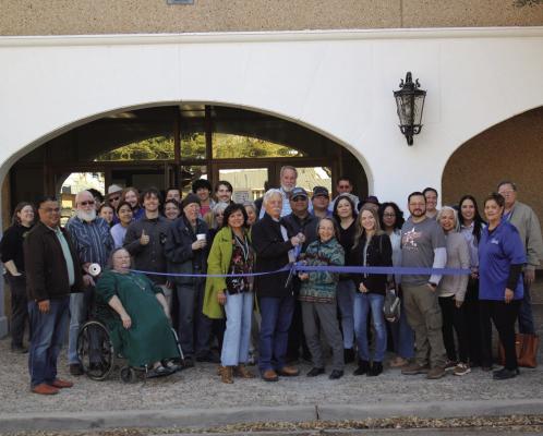 January 23, 2025 — Many gathered to usher in a new chapter for the beloved local Fort Stockton Public Library. The center for free literature and sources has expanded its hours and held a grand opening with a ribbon cutting facilitated by the Chamber of Commerce. The moment was followed by readings by local authors and free hot drinks. Photo by Joh Covington