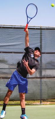 Fort Stockton’s No. 1 singles player Colton King dishes out a serve during his semifinal match against Cruz Rocha on March 26 at the Spring Comanche Classic in Fort Stockton. Photo by Nathan Heuer