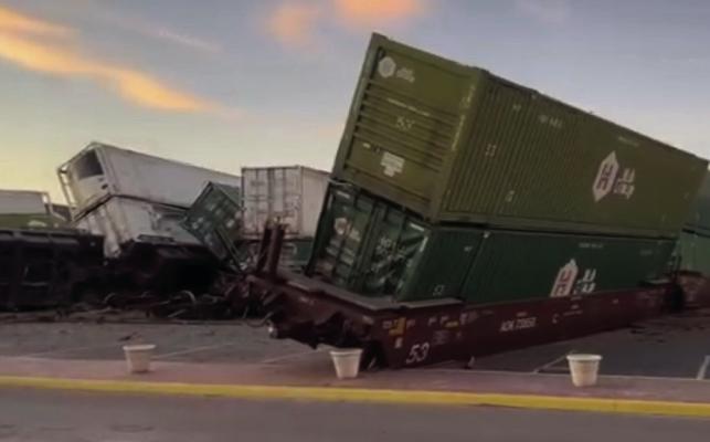 A train passing through Pecos was derailed and collided into the Reeves Chamber of Commerce building after striking a tractor-trailer last Wednesday.