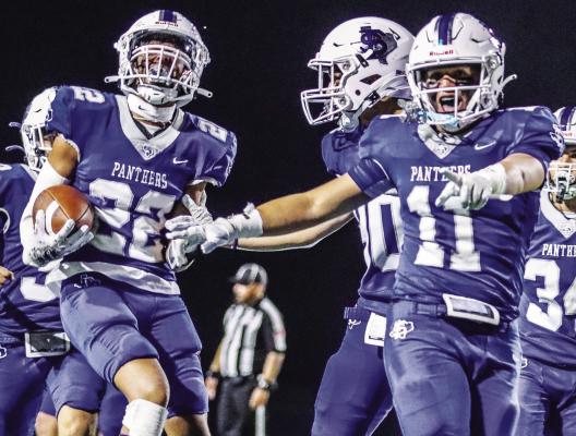 Fort Stockton players celebrate a play during their Sept. 1, 2023 game against Alpine. The Panthers remain in District 1-4A Division 2 after the latest UIL Realignment which was released Feb. 1, but the district will have a decidedly different look this fall. File photo by Shawn Yorks