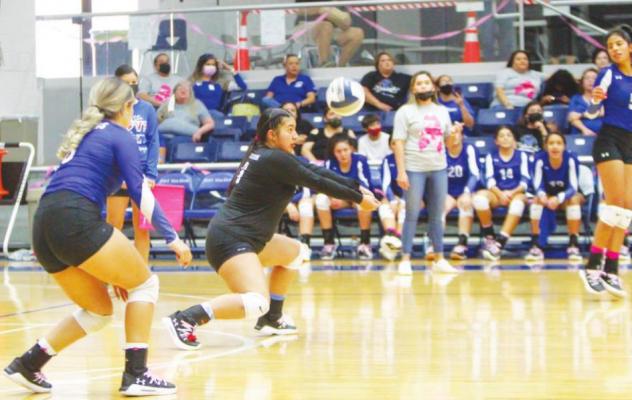 Aryanna Gonzalez receives a serve during the Prowlers five-set battle with Pecos on Oct. 8 at home. Photo by Nathan Heuer