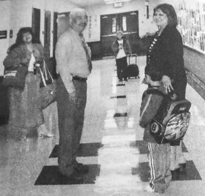 April 2009: GREETING WITH A SMILE – Alamo Elementary Principal Lorenzo Flores greets teachers and students most morning with a smile. Pictured is Ms. Rosie Dominguez, Mr. Flores, Haden Jackson, Ms. Sonya Castro and Kolbie James Carrillo.