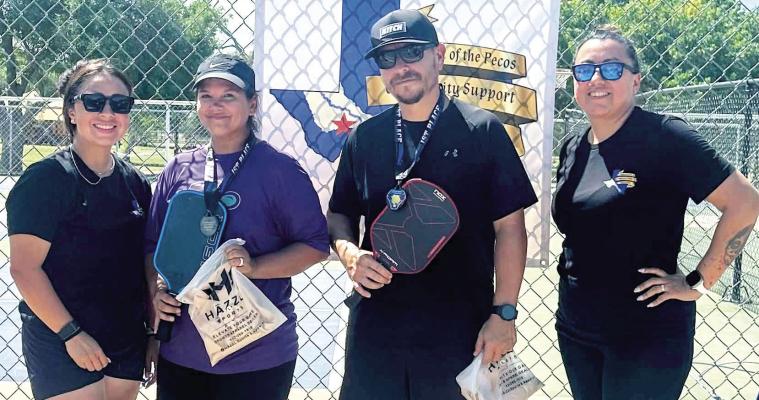 Amanda and Rudy pose after claiming first place in the mixed doubles division during the Law West of the Pecos Community Support Foundation’s inaugural pickleball fundraiser Saturday, Aug. 29, at Rooney Park. The tournament benefited Texas DPS Trooper Zach Vasquez and his family as he continues recovering from injuries sustained in a June crash. Courtesy Photo | Law West of the Pecos Community Support Foundation Facebook