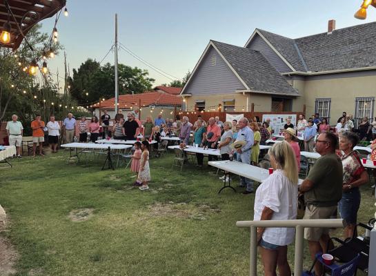 Last Thursday, the Annie Riggs Memorial Museum hosted another “Summer off the Patio” event for the community. Friends and families, pictured here singing the National Anthem, enjoyed the music of Kimmi Bitter. The next backyard-style concert will be on June 27 with Lee Mathis. Courtesy Photo