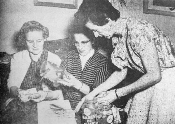 February 1958: MOTHER’S MARCH – From left are Mrs. Lillian Reeves, Mrs. Garnett McCallister, treasurer of the Pecos County March of Dimes campaign, and Mrs. Ruth Lewis. They’re counting the proceeds of the Fort Stockton Mother’s March on polio, which netted $960 for the drive. The march was sponsored by Omicron Mu chapter of Beta Sigma Phi sorority. Mrs. McCallister is also president of the sorority chapter.