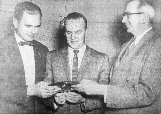 February 1958: OUTSTANDING – Nolan B. Conner (center), state Jaycee vice-president Jim Coates of Pecos (left) and 143rd district judge Dick Starley of Pecos admire the plaque given Conner as Fort Stockton’s outstanding young man of 1957 during the annual Distinguished Service Awards banquet at the Jaycee Club here Friday night.