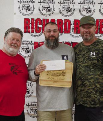 Jeremy Bowman, middle, from team Smoke ‘N’ Aces won the Brisket Division.