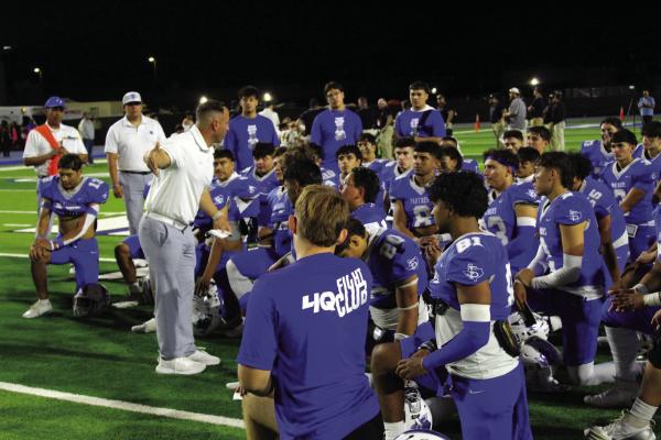 Athletic Director Jeremy Hickman coaching the Panthers after their tough loss, praising the team for never giving up. Photo by FSHS Yearbook student