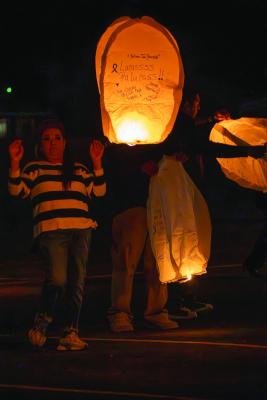 Attendees at the Eternity Funeral Home release lanterns into the night sky during the annual “Lanterns of Love” memorial service in Fort Stockton. The ceremony, which begins at approximately 7 p.m. following a chapel service, is held each February to mark the “month of love.” Pioneer Photo by Tristian Barragan