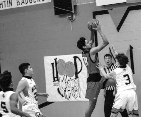 Iraan’s Kyler Ledford drives to the basketball for a layup on Dec. 30 in a home contest against McCamey. (Photo by Jessica Rodriguez)