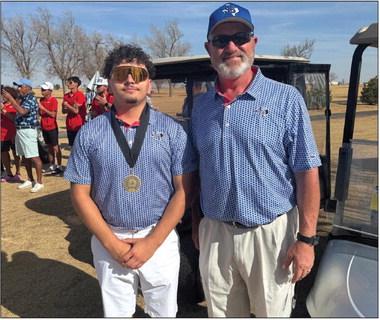 Panther Golfer, Ejay Ortiz, pictured with Coach Daggett. Oritz finished 8th out of 144 competitors at the Andrews Spring Invitational. Courtesy Photo