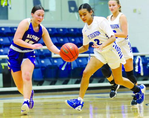 Havyn Gaytan fights off an Alpine defender during Thursday’s JV Tournament at the Bill and Virginia Williams Special Events Center. The Prowlers held off the Lady Bucks, 35-34. Photo by Shawn Yorks