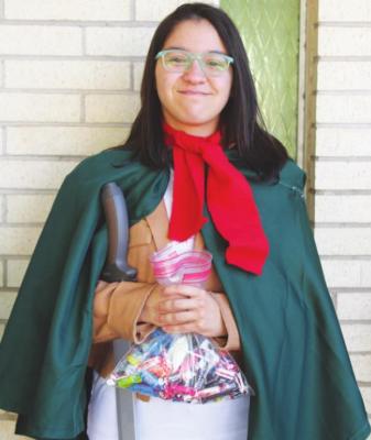 The runner-up of the costume contest was handed a full bag of candy, just in time for trick or treating. Photos by Megan Wehring