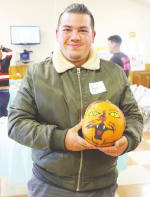 Creativity was flowing Saturday afternoon. While the judges evaluated a swarm of pumpkin canvases including smiley faces and ocean scenery, the winner of the pumpkin painting contest showed incredible detail in his take on a cat.
