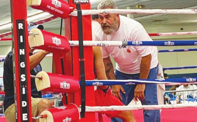 Joshua Franco’s grandfather and coach Raymond Franco gives him advice between rounds at his past weekend’s July Bash. Courtesy Photo
