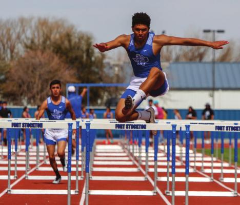 Fort Stockton’s Zane Hodges clears the final hurdle on his way to a first-place finish in the 110-meter hurdle race at the Comanche Relays on Saturday, Feb. 27. Photo by Nathan Heuer