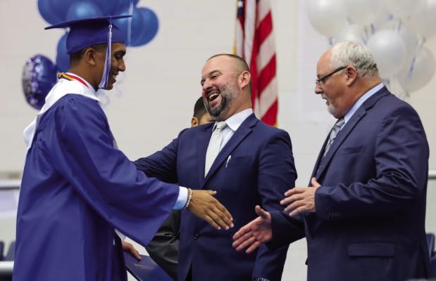 Zane Hodges, left shares a laugh with superintendent Dr. Gabriel Zamora. Photo by Shawn Yorks
