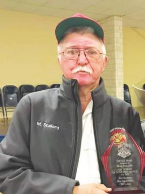 Mike Stallard was presented an award for 20 years of service at the fire department banquet.