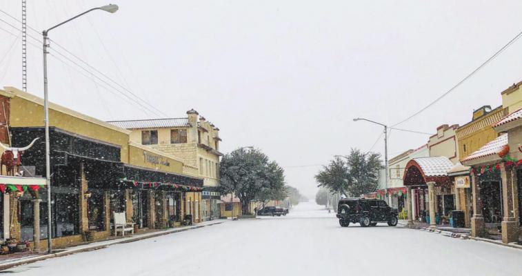 Fort Stockton’s Main Street resembled a slick skating rink as the winter storm dumped freezing ice and snow last week. Photo by Jeremy Gonzalez