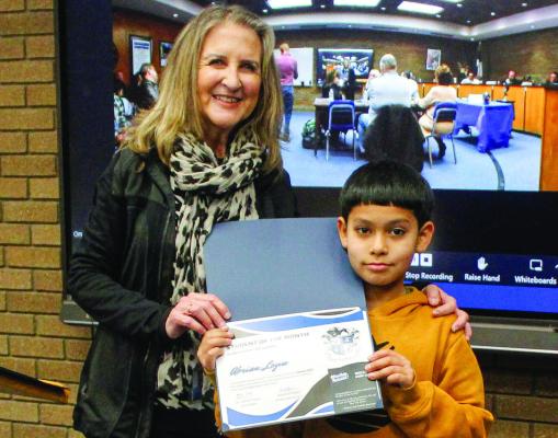 Alamo Student of the Month Abrian Leyva, right, and assistant principal Cathy Havins.