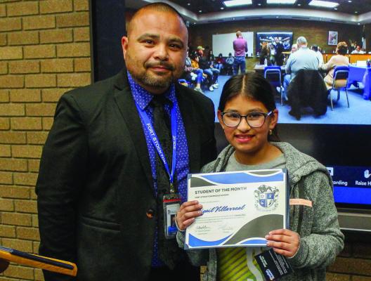 Middle School Student of the Month Abigail Villarreal, right, and principal Sammy Soliz.