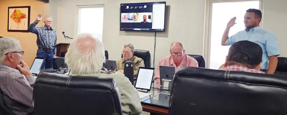 Pecos County Resident, Tommy Ezell and General Manager Ty Edwards during a sworn testimonial and protest of the water drilling permits during Tuesday, Oct. 20, Middle Pecos Groundwater Conservation District meeting. Photo by Pioneer