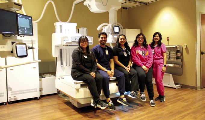 Pictured left to right, the Pecos County Memorial Hospital District staff, seen standing with one of three brand new equipment updates at the hospital, Noelia Molina, Brandon Hernandez, Stephany Rivas, Mayra Saucedo, and Sonia SanAgustin. The new medical equipment is essential for pain management, diagnoses, and patient comfort.
